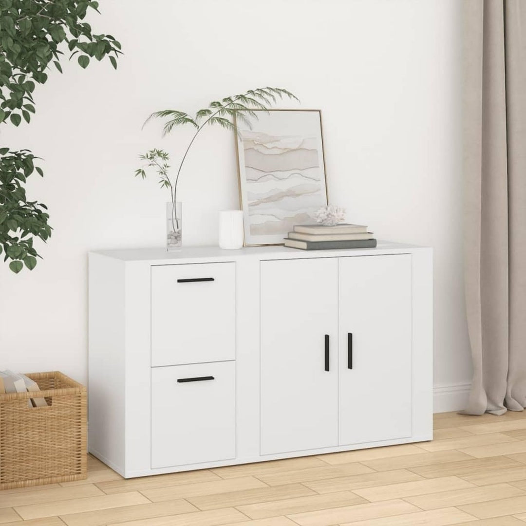 Das Sideboard misst 100 x 33 x 59.5 cm in Weiss