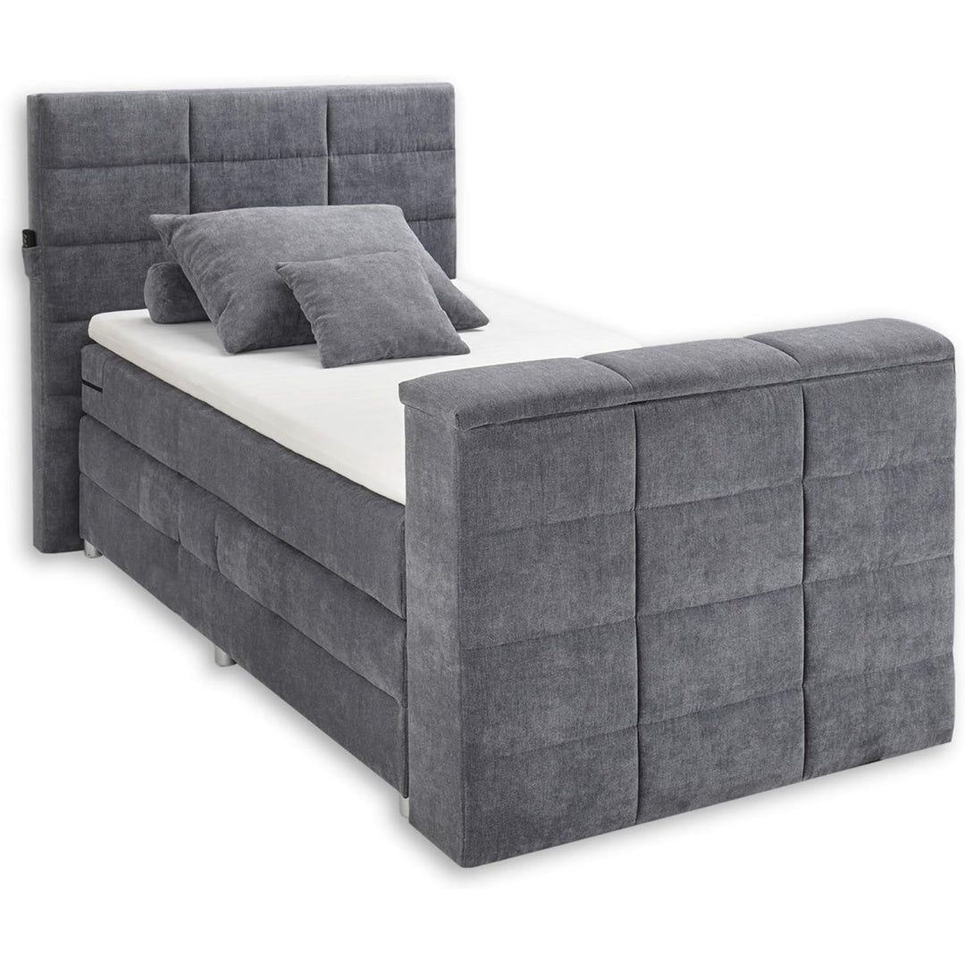Boxspringbett mit einem Bettkasten und einer Fussauflage