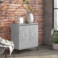 Ein Metallgestell praegt das Sideboard in Betongrau
